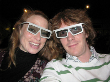 image of couple wearing 3D glasses