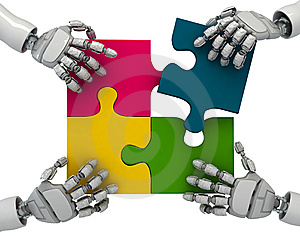image of robot hands and puzzel